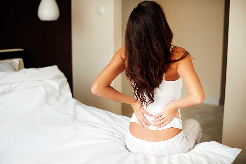 Sự hình thành khối u ở cổ tử cung có thể gây ra triệu chứng đau nhiều ở vùng lưng dưới