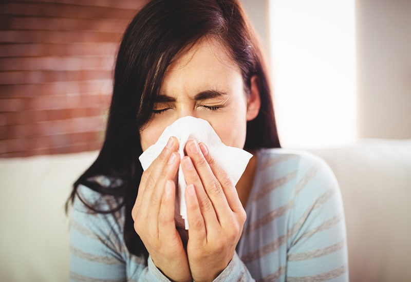 Hắt hơi là biểu hiện thường gặp ở nhiều loại cúm