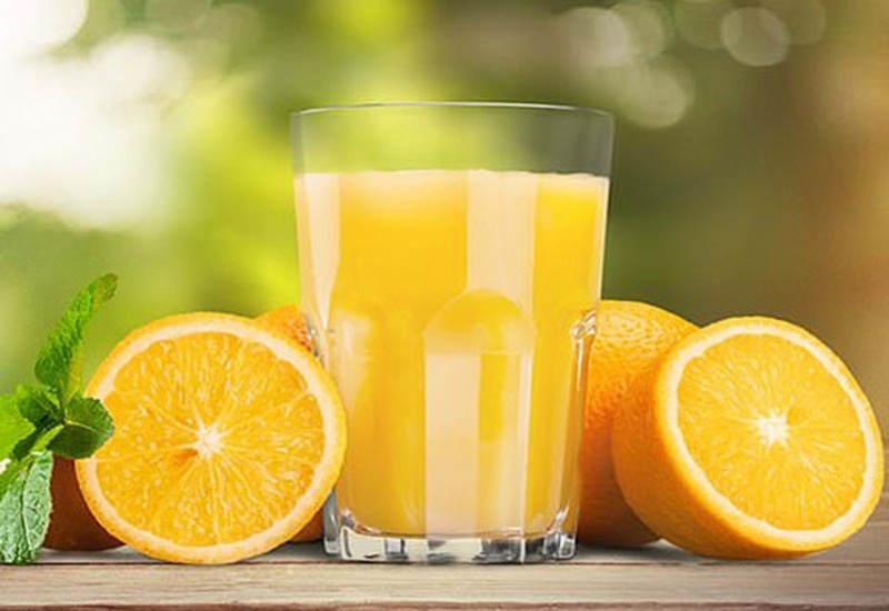 Uống nước cam góp phần giúp làm giảm đau dạ con sau sinh