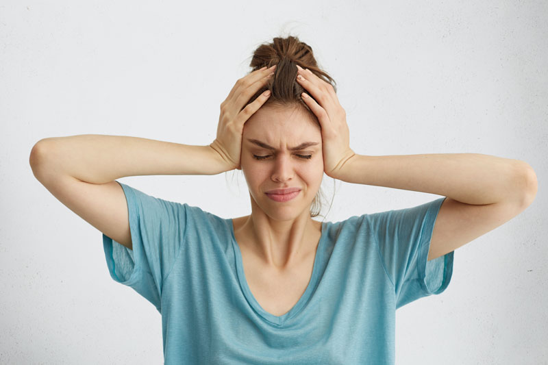 Đau đầu căng cơ là một nguyên nhân gây đau da đầu