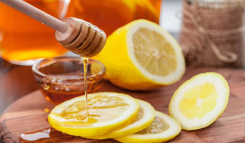 Ảnh hưởng đến hệ tiêu hóa là một trong những tác hại của nước chanh mật ong